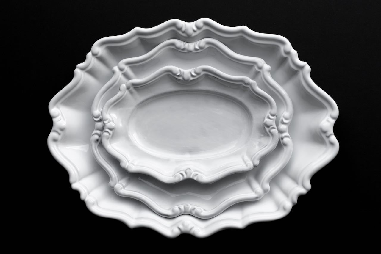 Serving platters handmade by Mathilde Carron-Astier de Villatte