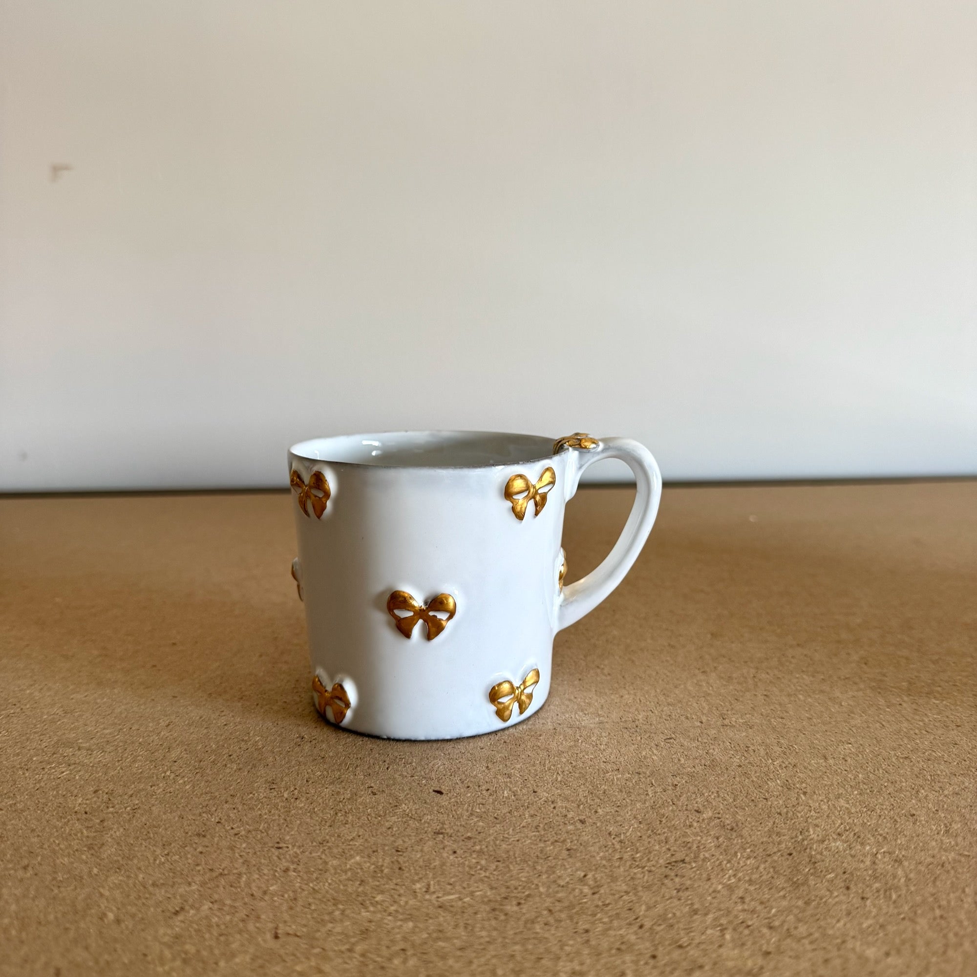 Nœud-Nœud gold mug with handle M